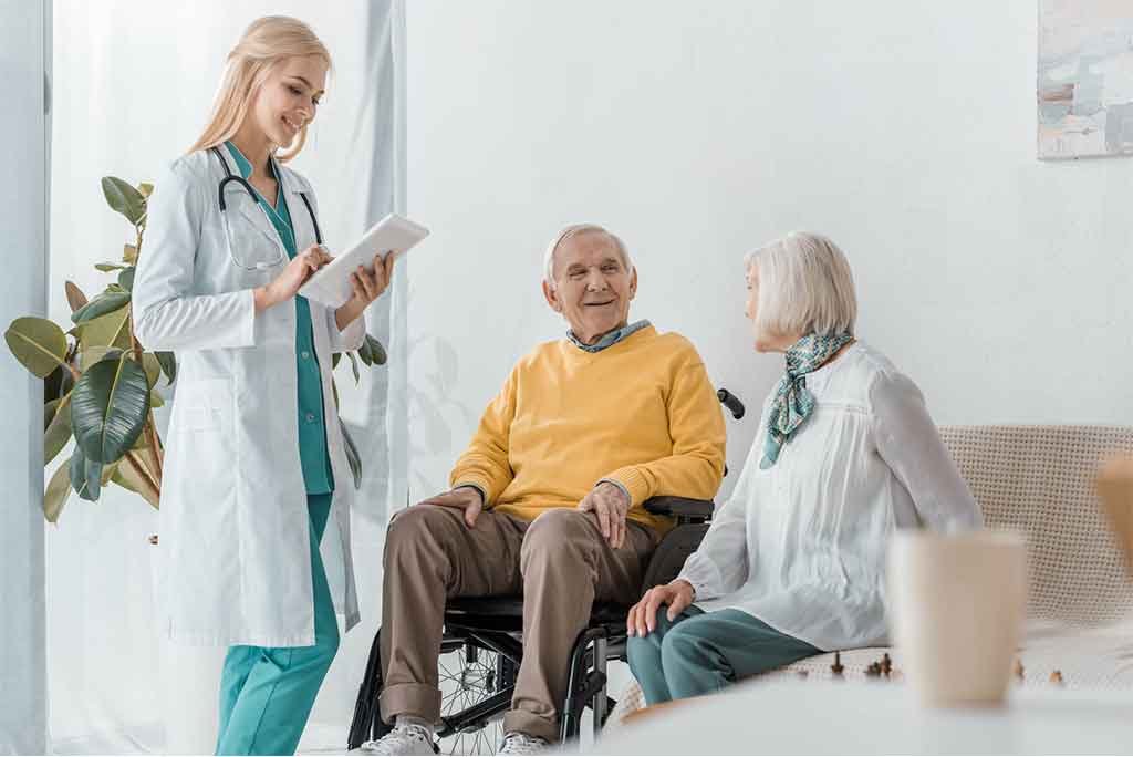 image of lady GP doctor consult elder patient at in the convivence