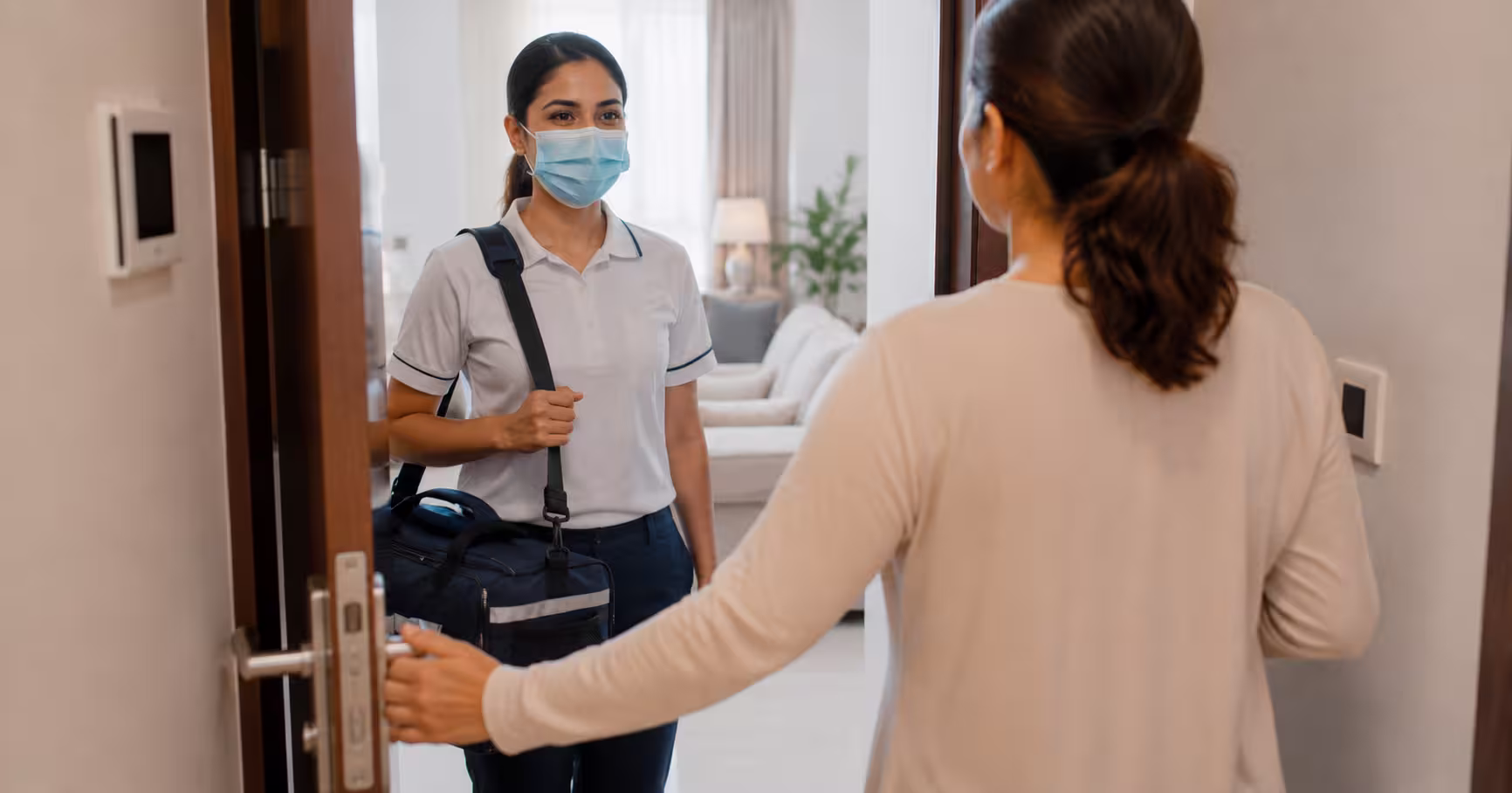 affordable home physiotherapy near me - DrPlus licensed physiotherapist arriving for a home visit in Dubai