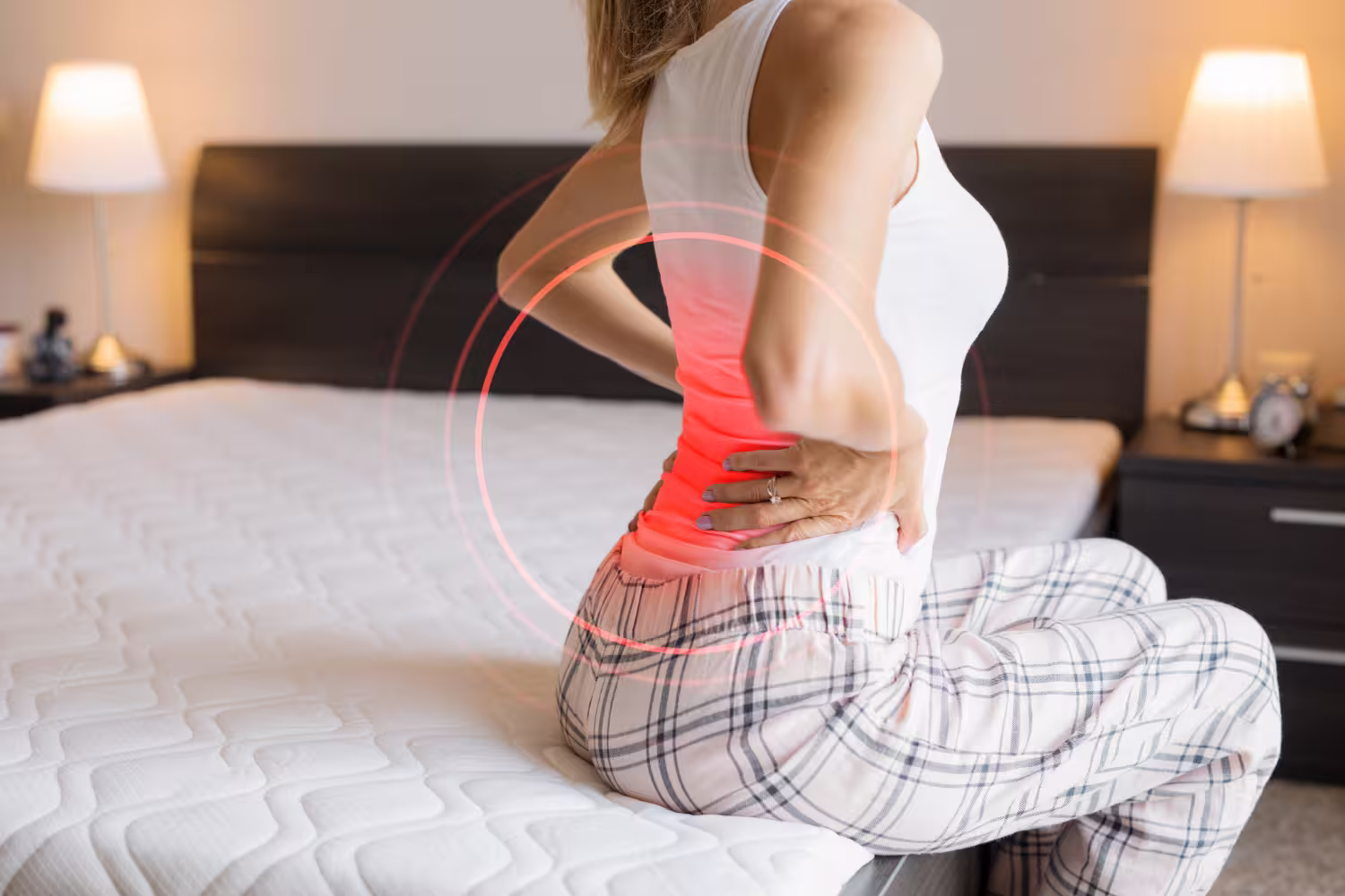 which doctor to see for back pain - DrPlus home doctor assessing patient for musculoskeletal pain